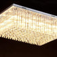 Saint Mossi 12-Lights Modern Chandelier Lamp K9 Crystal Chandelier Light Fixture,Modern Flush Mount Ceiling Light Fixture Raindrop Chandelier for Bedroom,Dining Room,Livingroom,L32" x W22" x H10"